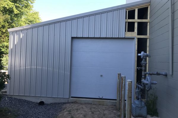 Pump House Commercial Door installation in Quakertown PA. We installed a Haas model 610 flush door, in grey.