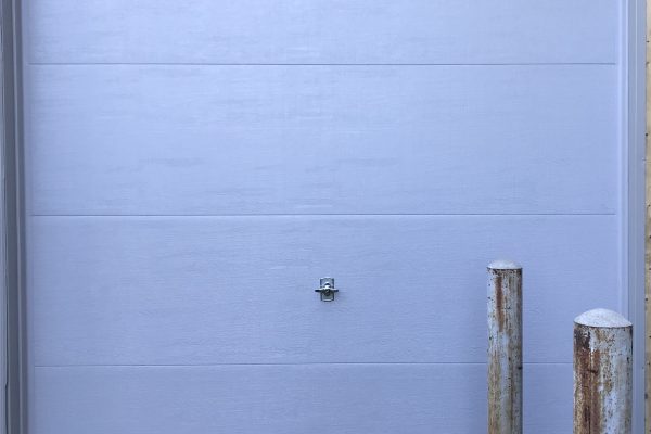 Pump House Commercial Door installation in Quakertown PA. We installed a Haas model 610 flush door, in grey.